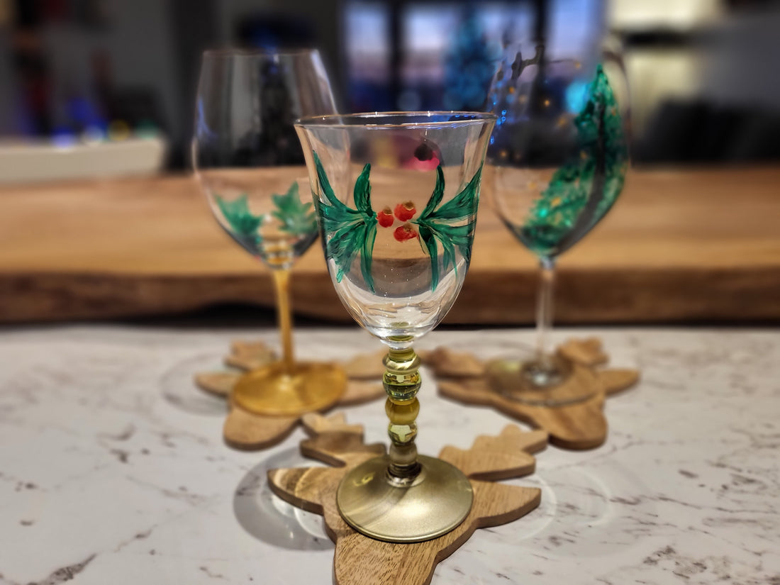 Christmas themed painting on wine glasses!